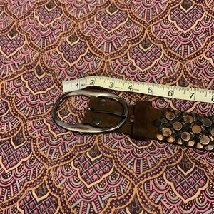 Brown belt with grommets